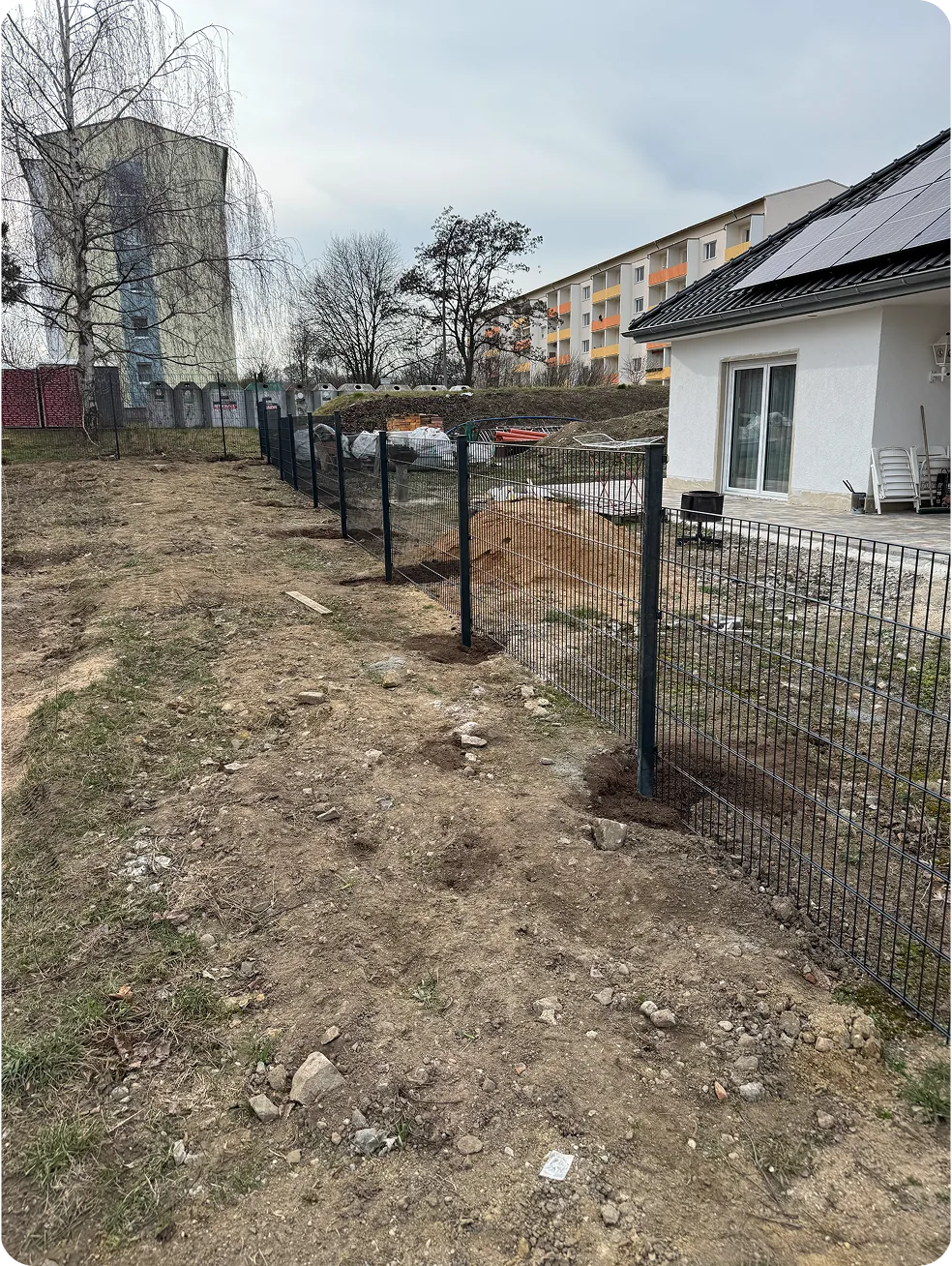 Natursteinmauer und Gartenweg als Referenzprojekt